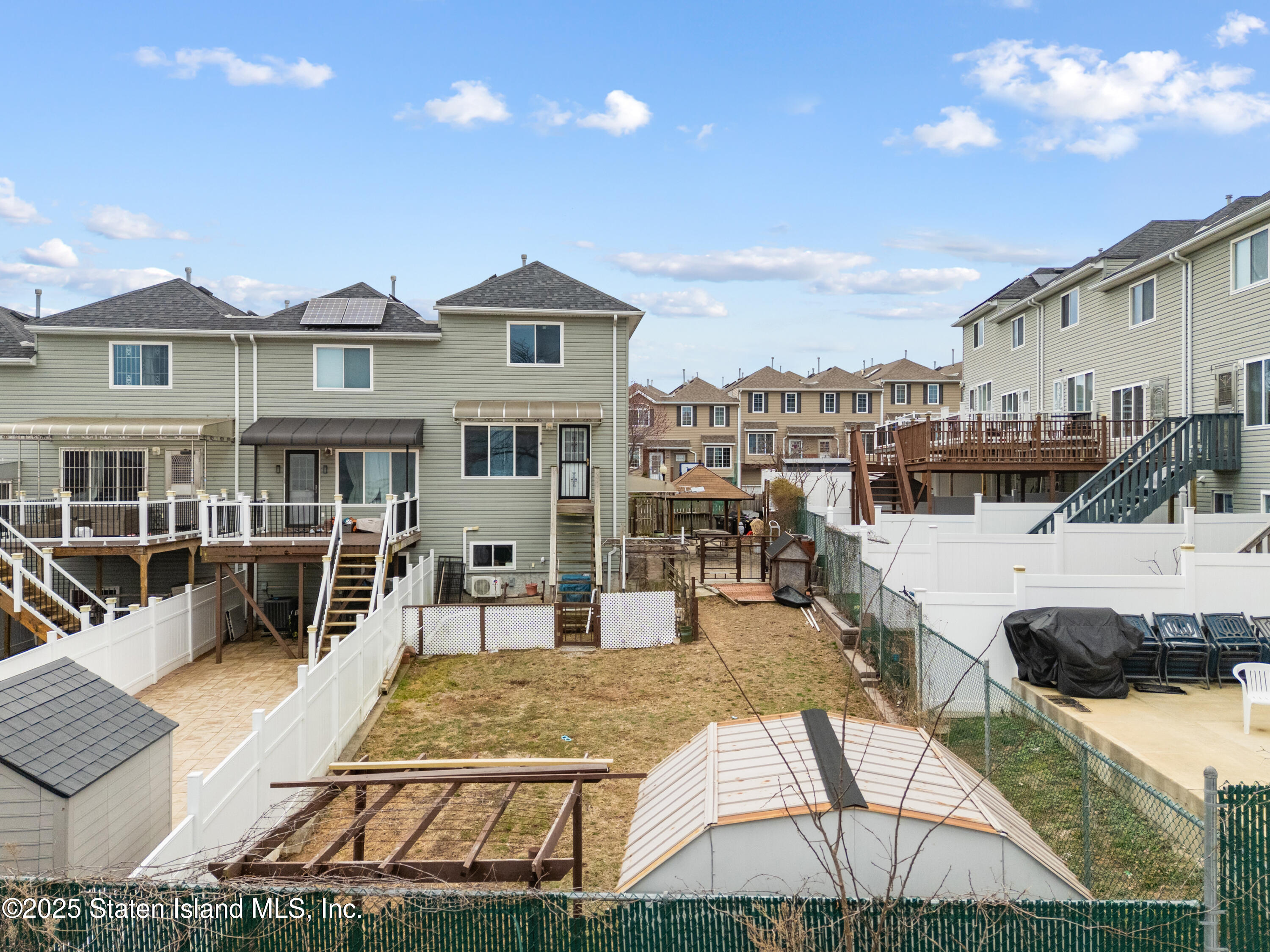 41 Burgundy Loop Staten Island, NY 10304 - Photo 26 of 29 a view of a house with sitting area