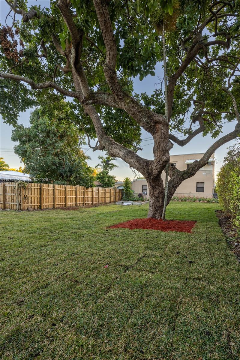 6070 Southwest 42nd Street Miami, FL 33155 - Photo 31 of 40 a green field with lots of trees