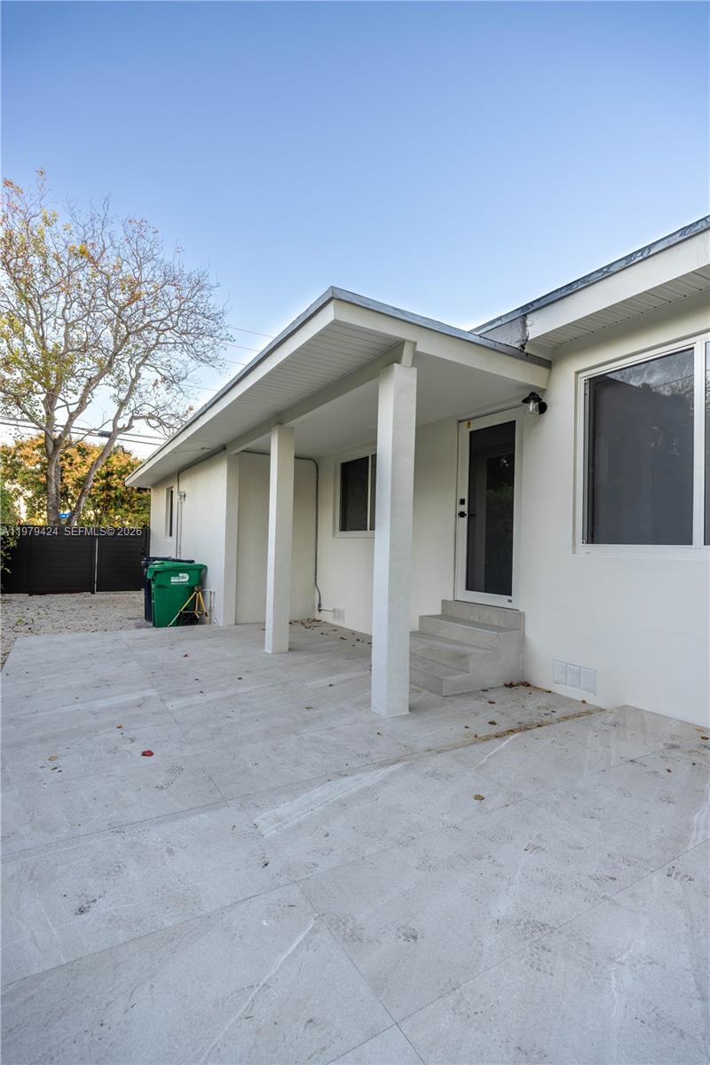 6070 Southwest 42nd Street Miami, FL 33155 - Photo 36 of 40 a view of a house with a outdoor space