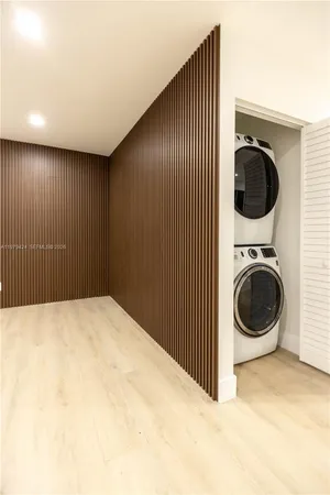 a view of a storage & utility room with washer and dryer