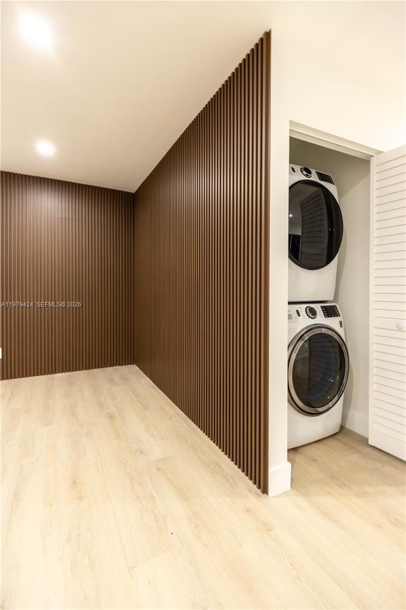 6070 Southwest 42nd Street Miami, FL 33155 - Photo 9 of 40 a view of a storage & utility room with washer and dryer