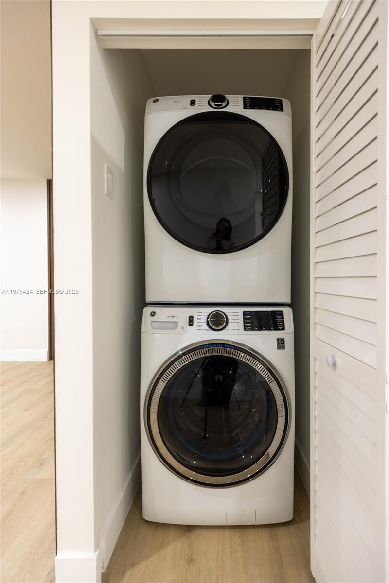 6070 Southwest 42nd Street Miami, FL 33155 - Photo 10 of 40 a utility room with dryer and washer