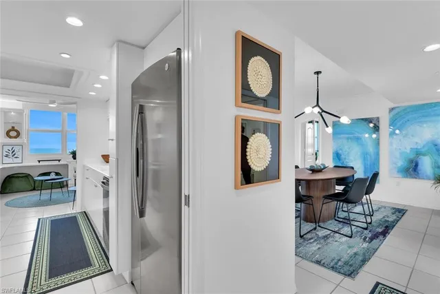 a spacious bedroom with a bed and a couch