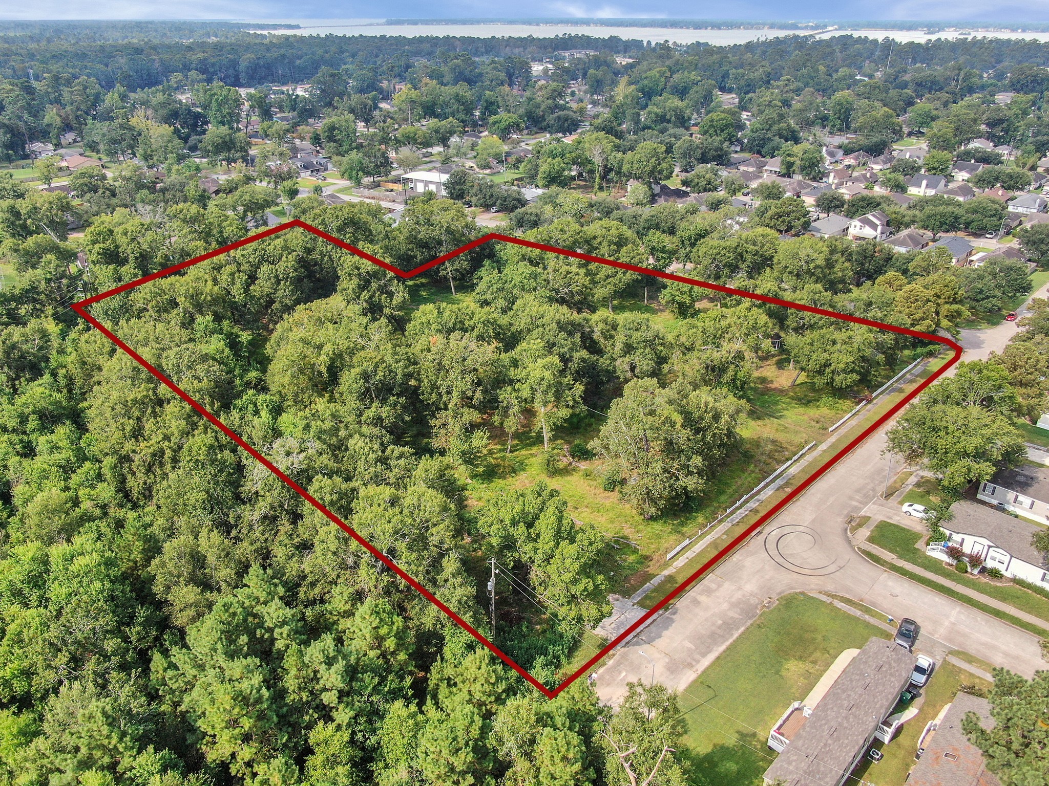 0 Silver Maple Drive Huffman, TX 77336 - Photo 2 of 14 an aerial view of residential houses with outdoor space and trees