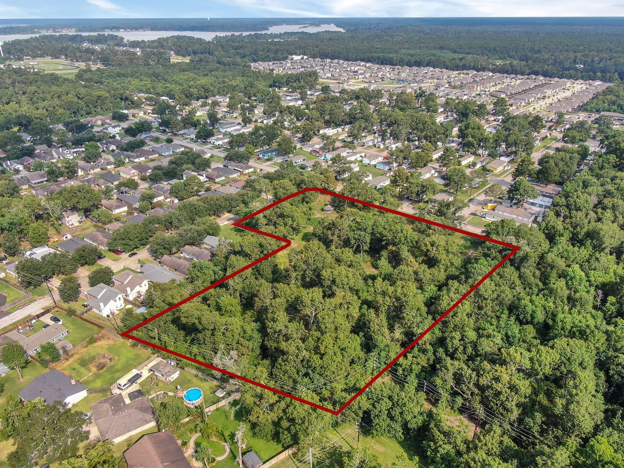0 Silver Maple Drive Huffman, TX 77336 - Photo 7 of 14 an aerial view of residential houses with outdoor space and trees