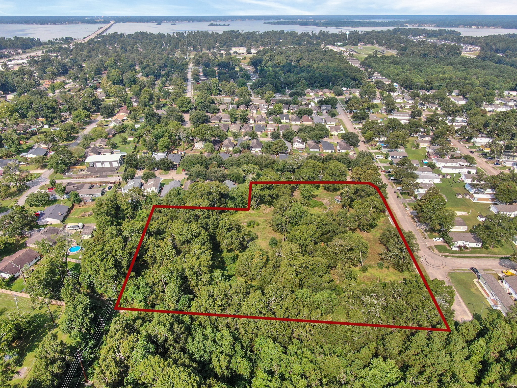 0 Silver Maple Drive Huffman, TX 77336 - Photo 8 of 14 an aerial view of residential houses with outdoor space