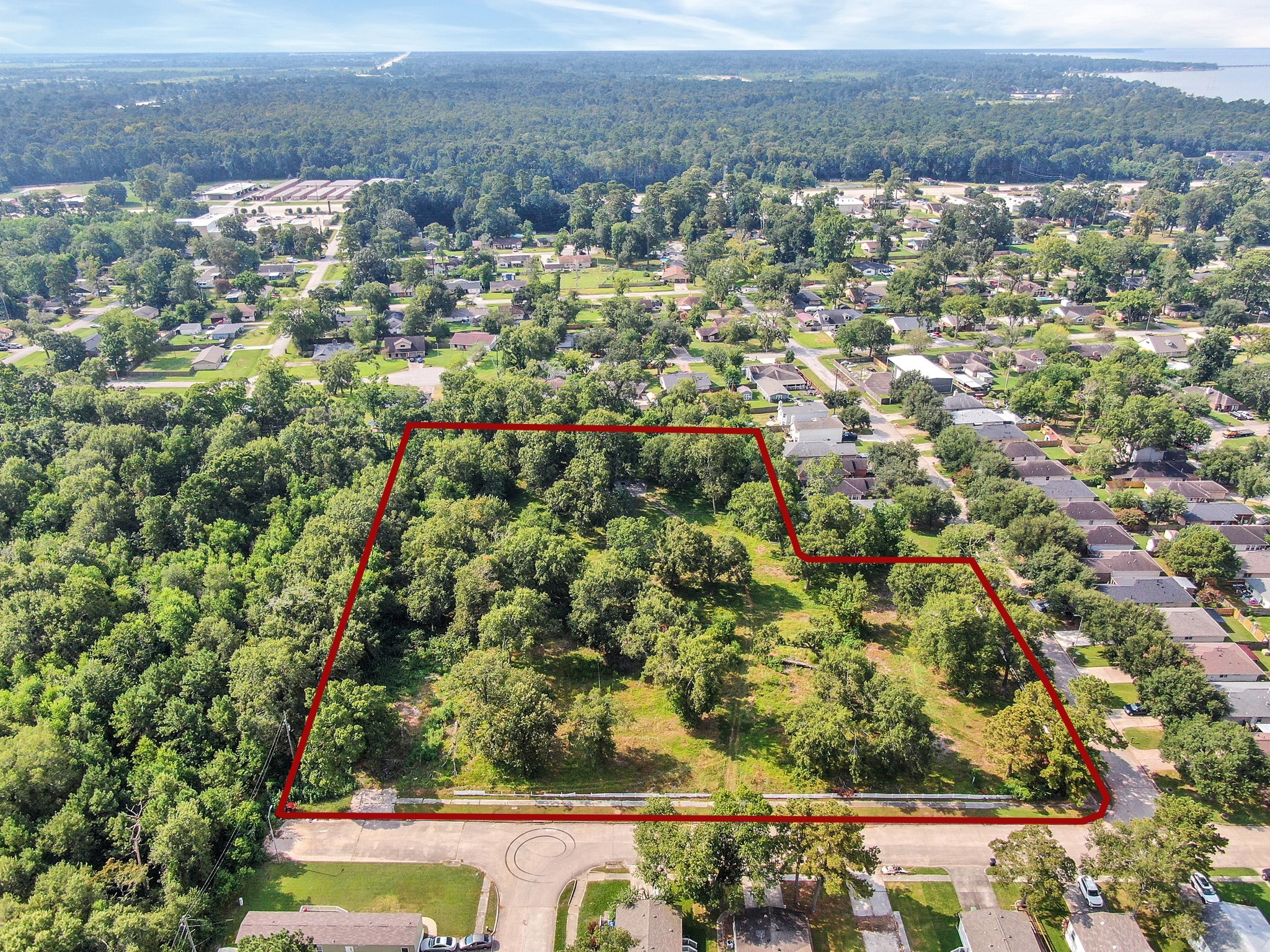 0 Silver Maple Drive Huffman, TX 77336 - Photo 9 of 14 an aerial view of residential houses with outdoor space and trees
