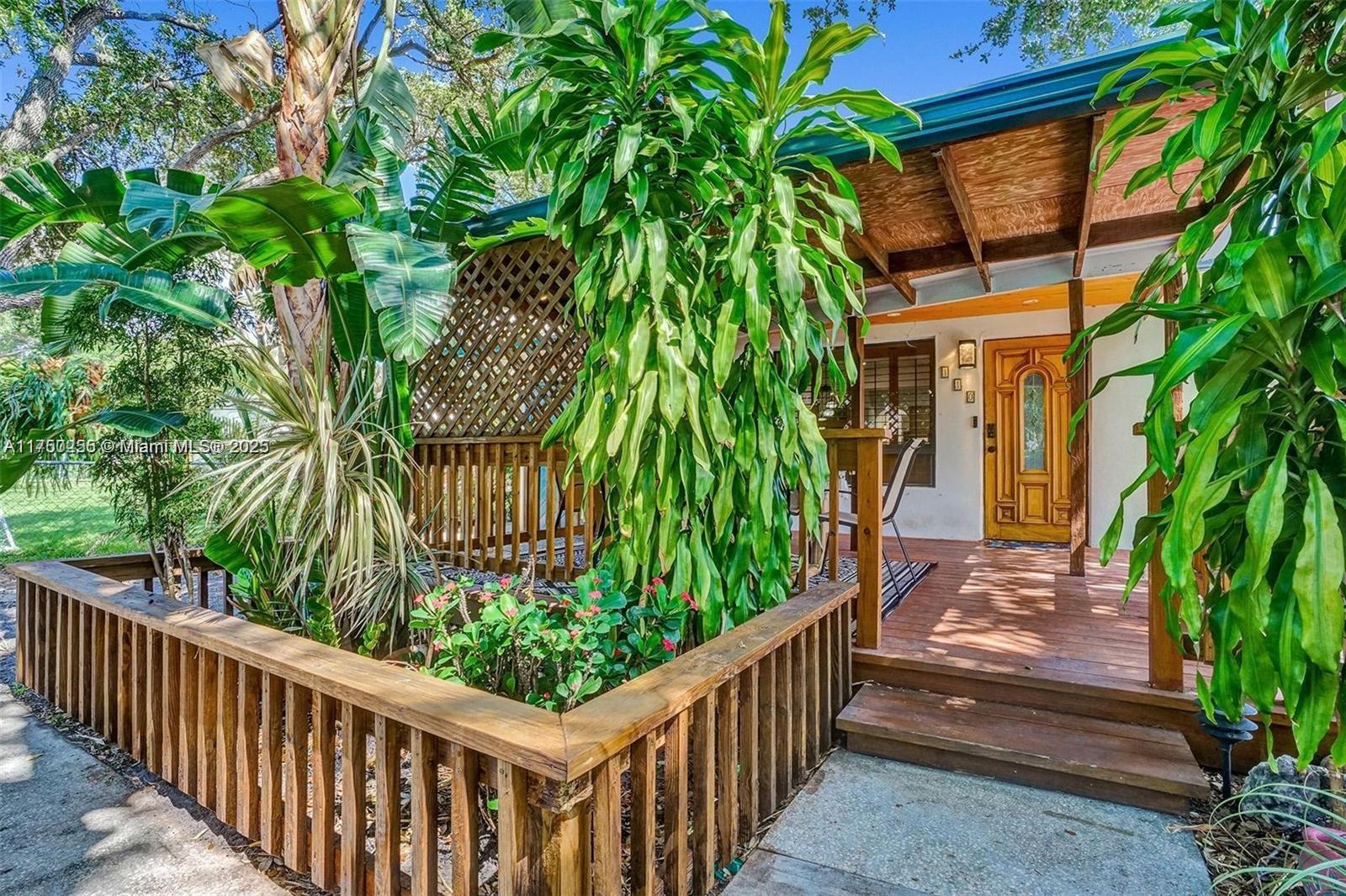 110 Southwest 5th Street Hallandale Beach, FL 33009 - Photo 15 of 26 a porch with seating space