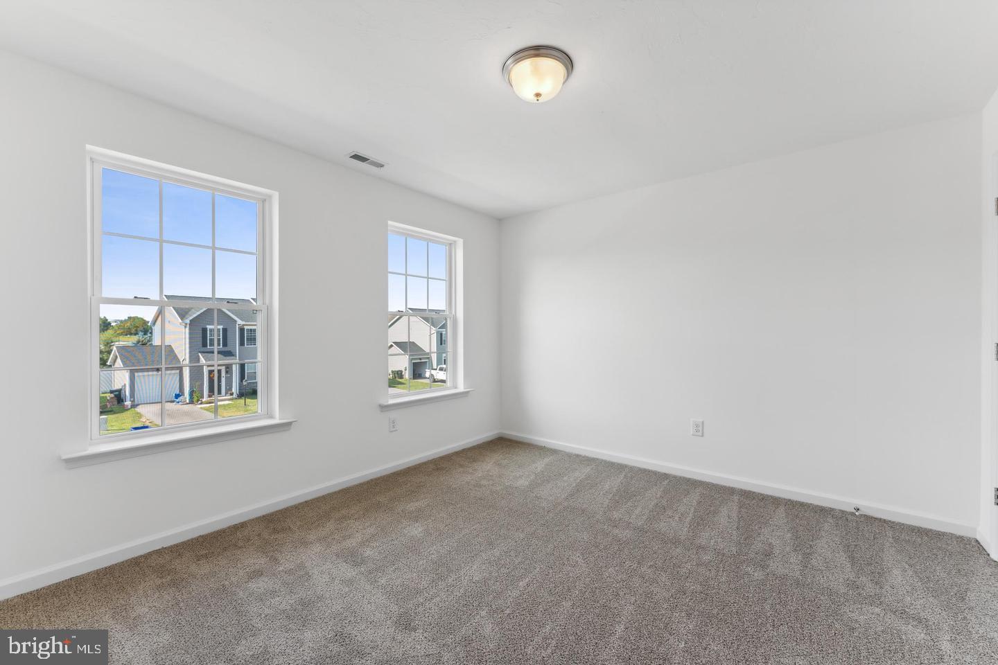 3637 Fieldstone Drive Dover, PA 17315 - Photo 11 of 19 an empty room with windows