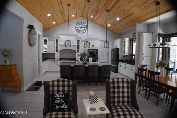 a view of a dining room with furniture window and outside view