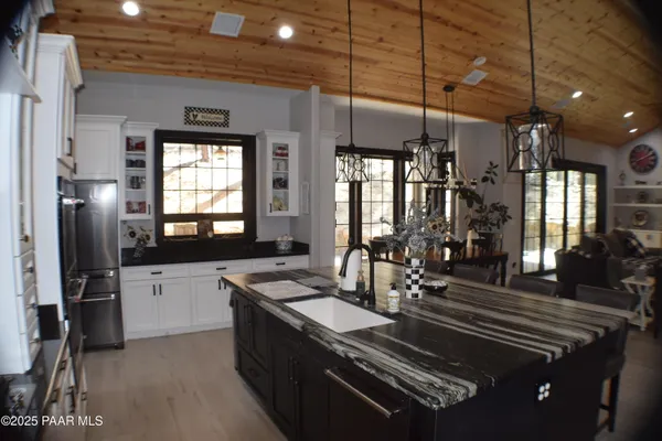 a kitchen with granite countertop lots of counter top space