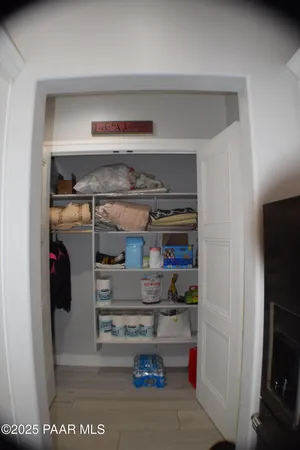 a workspace with furniture and book shelf