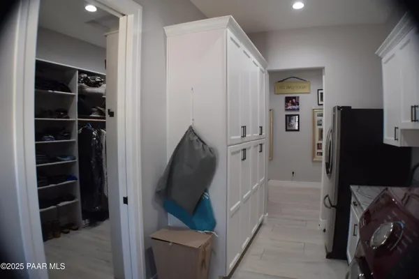 a bedroom with a bed and furniture