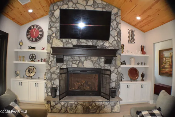 a room with wooden door and glass windows
