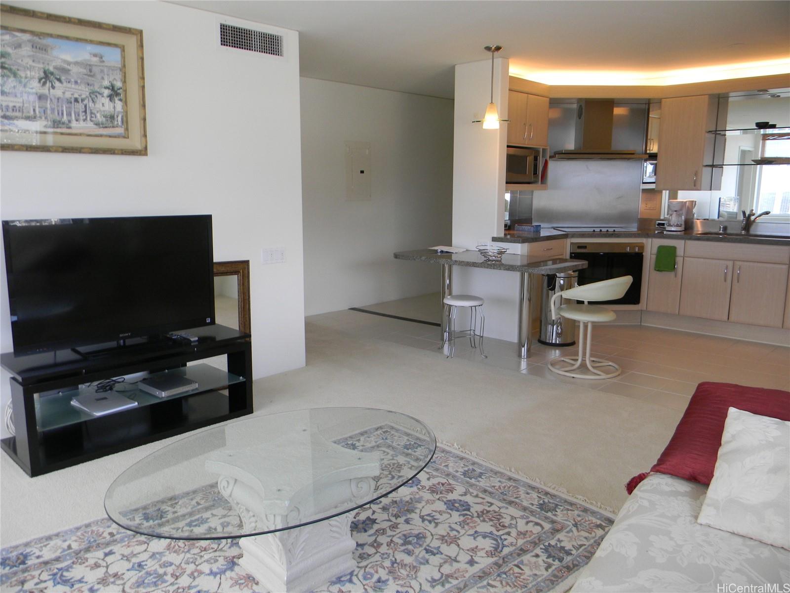 88 Piikoi Street, Unit 3604 Honolulu, HI 96814 - Photo 7 of 7 Living room kitchen, entry (unit unfurnished)