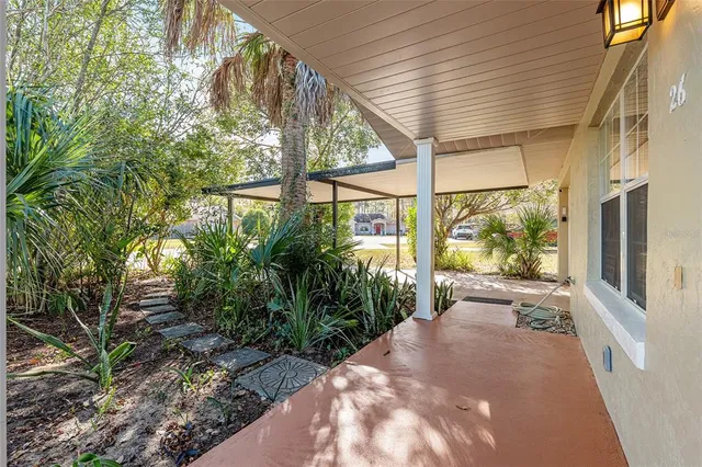 a view of a back yard from a balcony