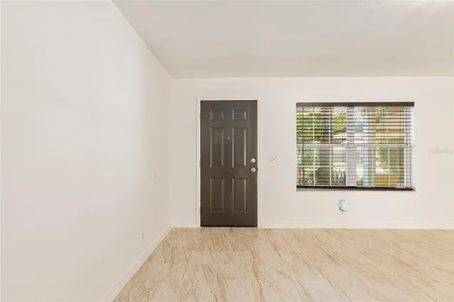 a view of a room with a window