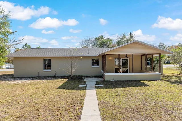 a view of a yard with an trees