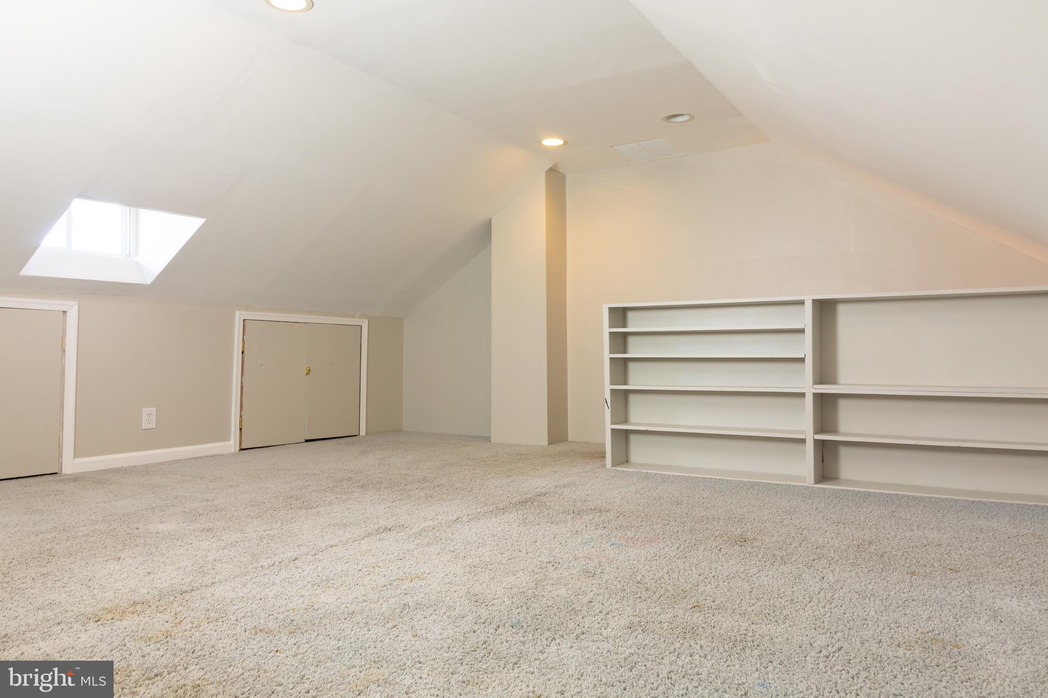 1914 Heathfield Road Baltimore, MD 21239 - Photo 35 of 40 Attic Bedroom