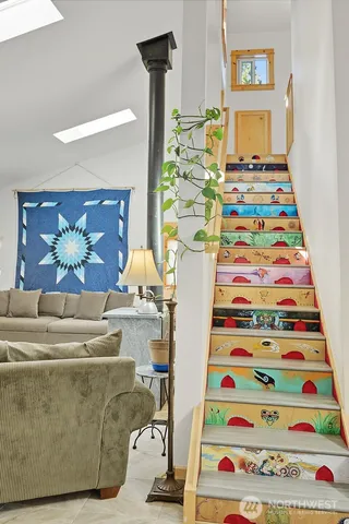 a bedroom with a bed and a table