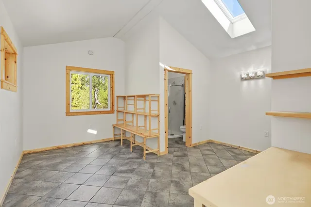 a view of livingroom with furniture and windows