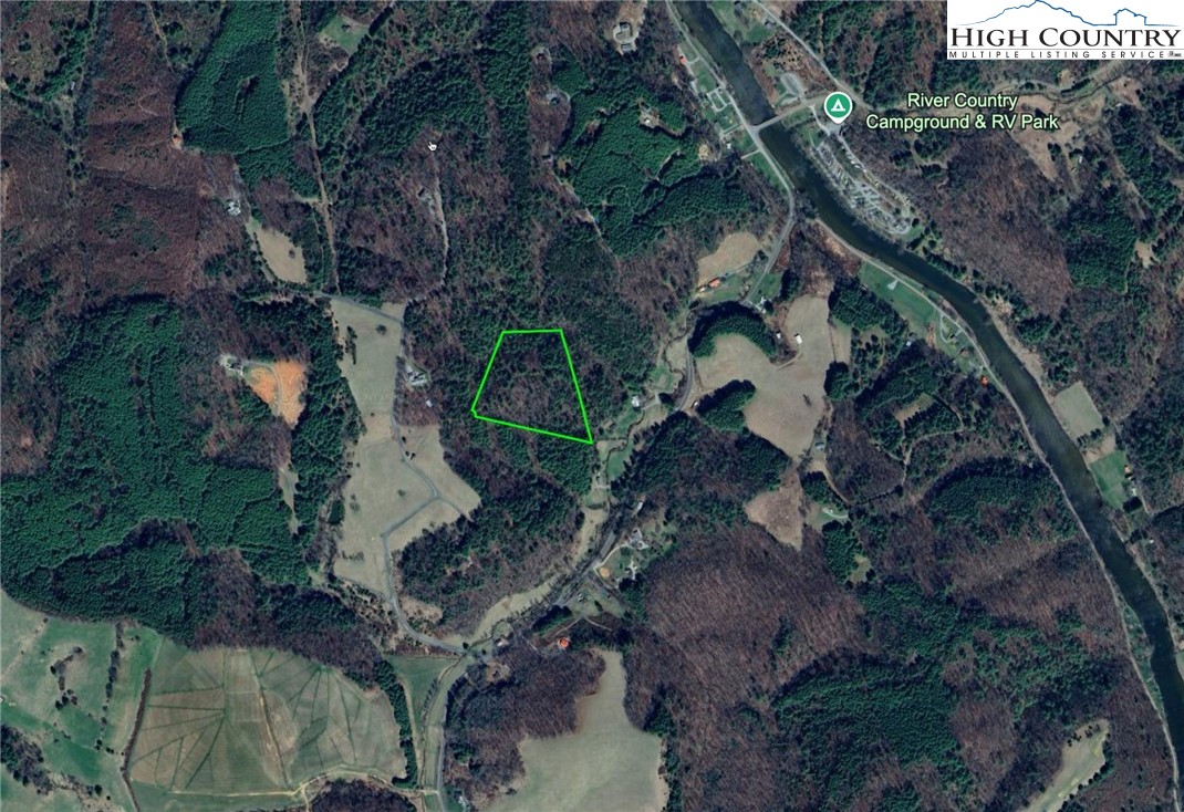 Lot 4 Running Cedar Lane Crumpler, NC 28617 - Photo 17 of 19 a aerial view of house with outdoor space