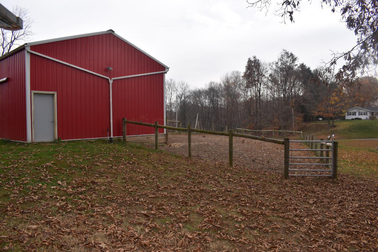 5530 Westfall Road Southwest Lancaster, OH 43130 - Photo 62 of 74 Man door, frost free hydrant, fenced pasture. All barns have downspouts and gutters