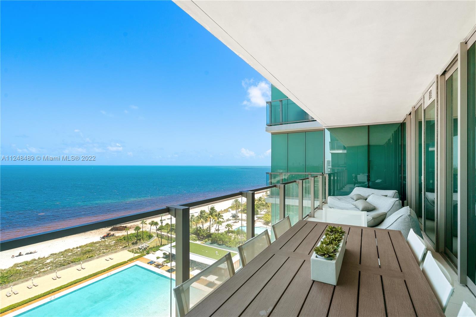 360 Ocean Drive, Unit 1106S Key Biscayne, FL 33149 - Photo 5 of 46 a view of balcony with furniture