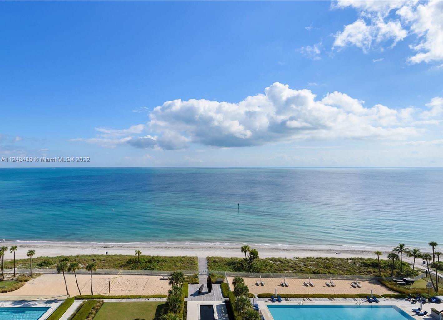 360 Ocean Drive, Unit 1106S Key Biscayne, FL 33149 - Photo 6 of 46 a view of a swimming pool with an outdoor space