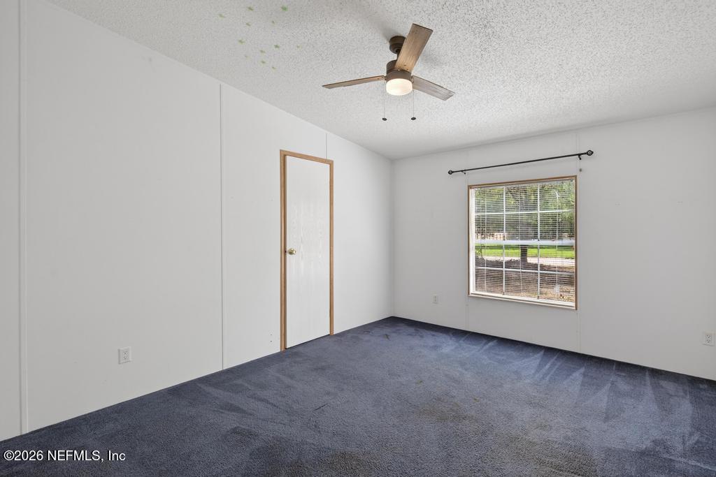54059 Charles Street Callahan, FL 32011 - Photo 20 of 50 an empty room with a window