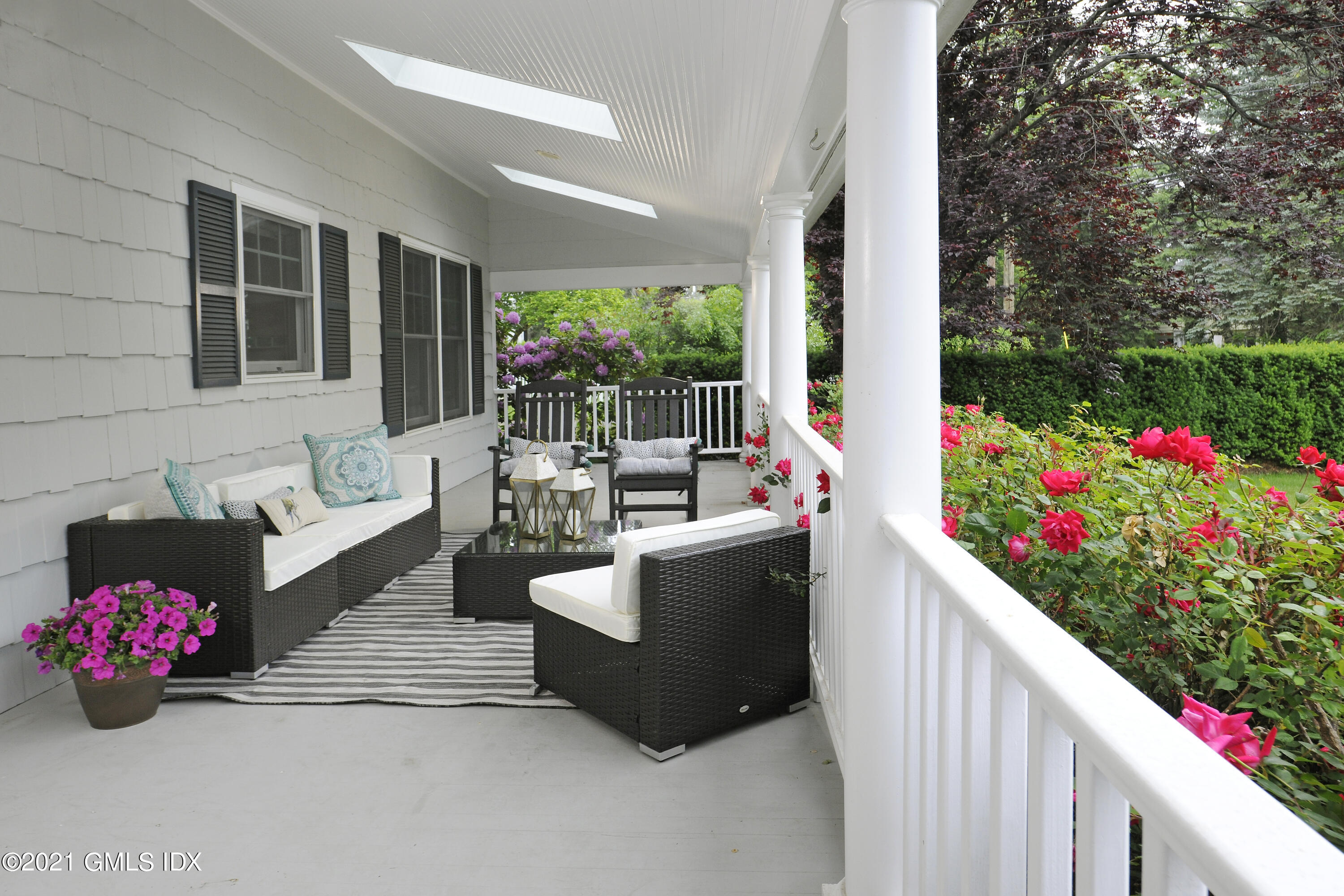 145 Shore Road Old Greenwich, CT 06870 - Photo 20 of 25 a outdoor living space with furniture and garden view