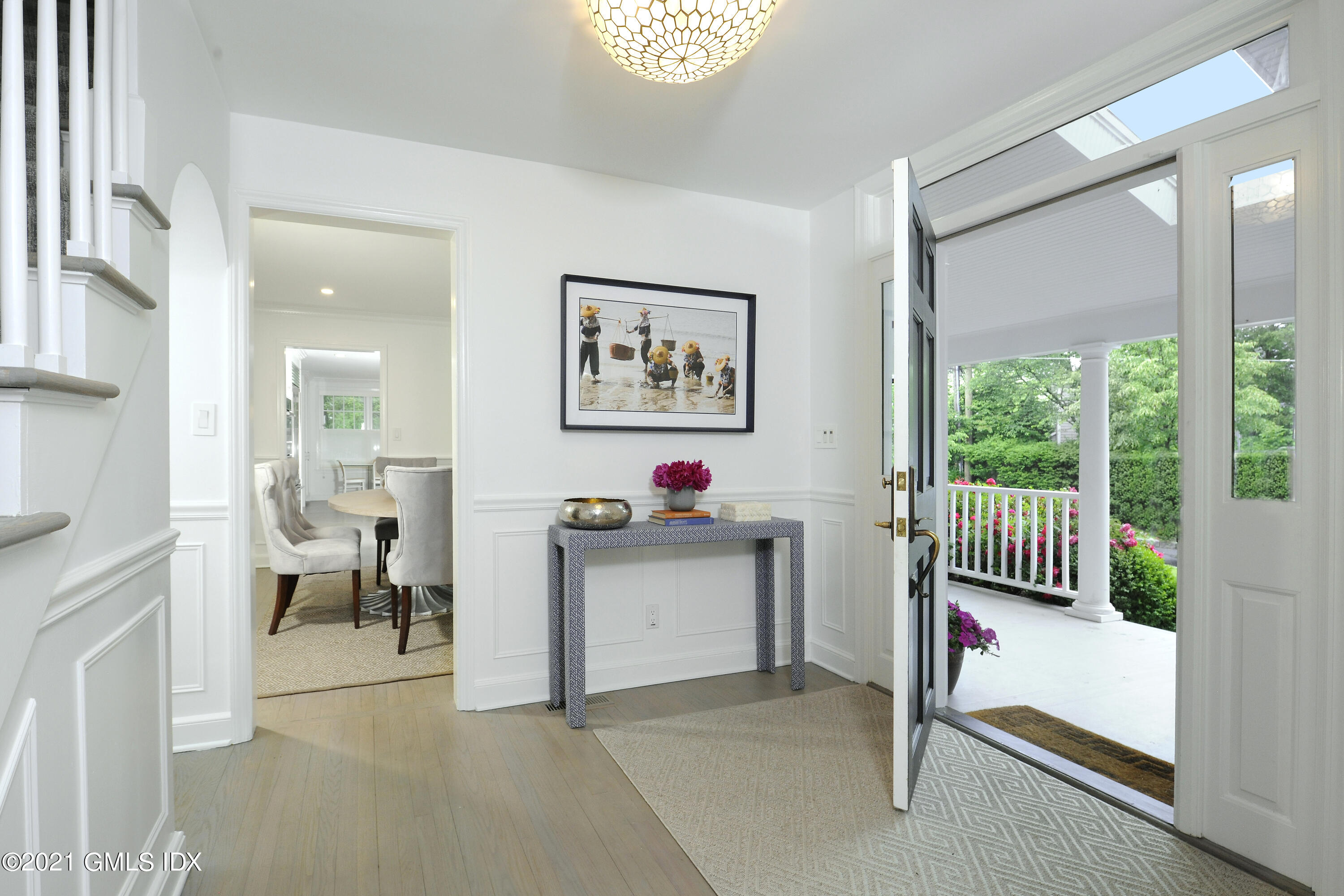 145 Shore Road Old Greenwich, CT 06870 - Photo 2 of 25 a view of an entryway with wooden floor