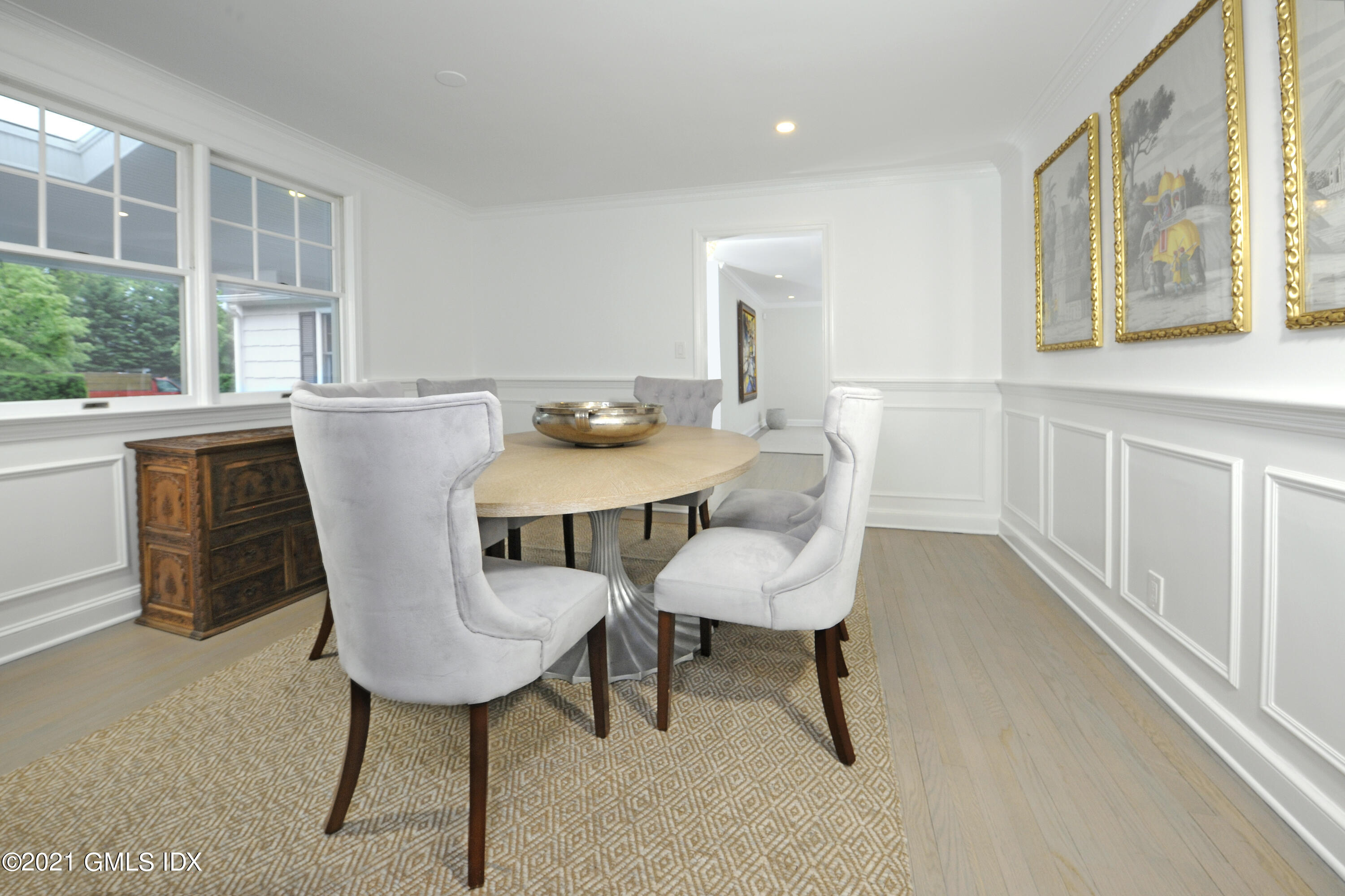 145 Shore Road Old Greenwich, CT 06870 - Photo 7 of 25 a view of a dining room with furniture window and outside view