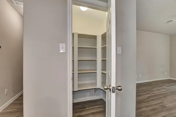 an aerial view of a house with a swimming pool