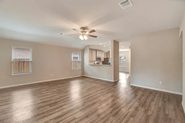 a kitchen with stainless steel appliances a refrigerator sink and stove