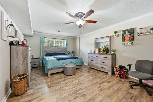 a bedroom with a bed and furniture