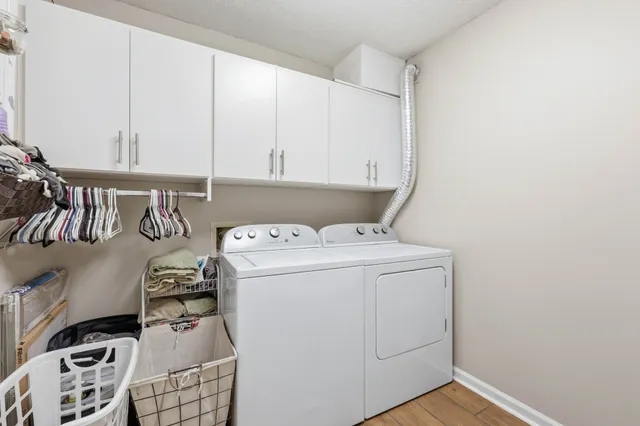a utility room with dryer and washer
