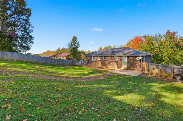 a view of a house with a big yard