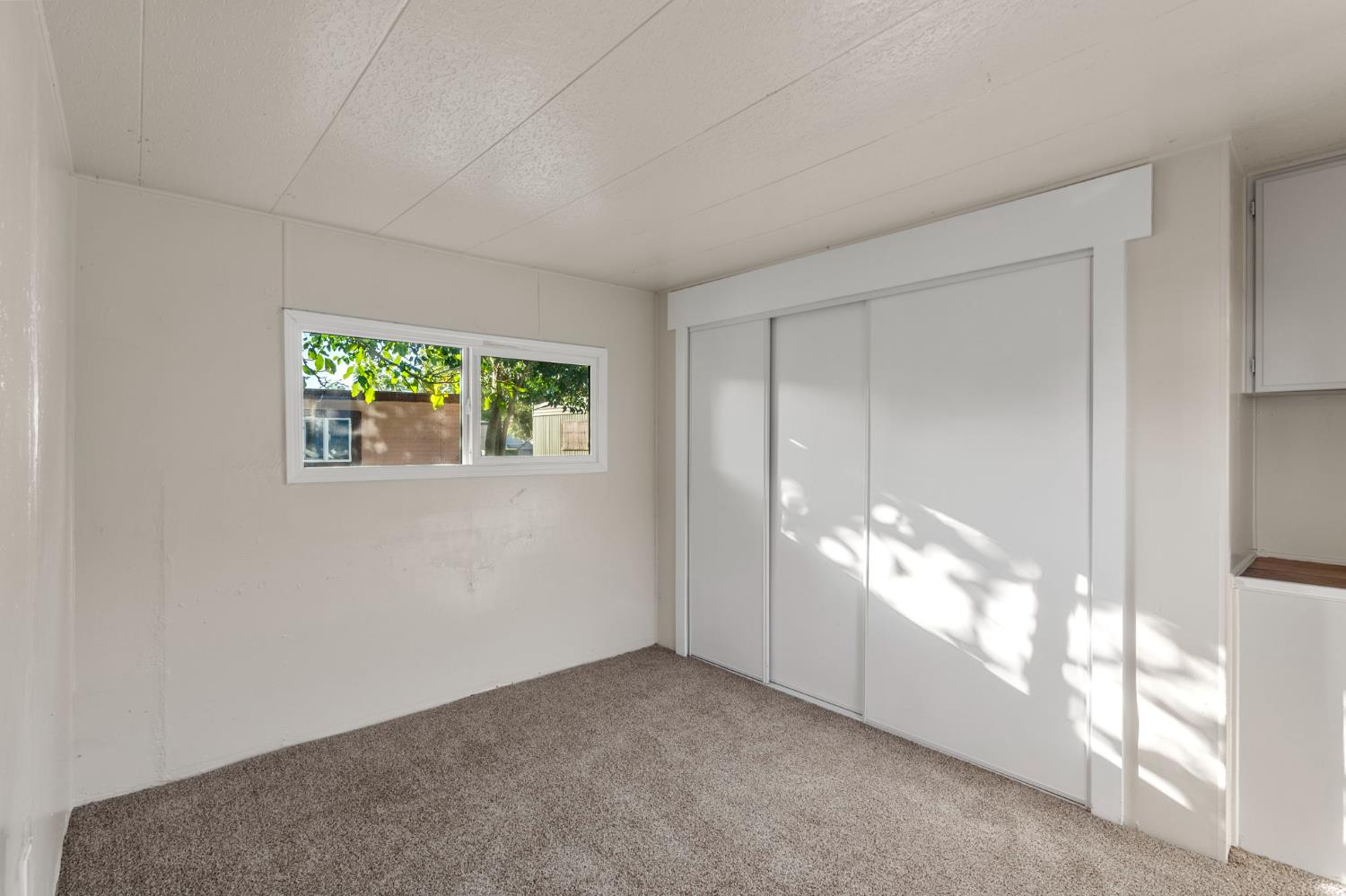 1523 North Beale Road, Unit 38 Marysville, CA 95901 - Photo 17 of 24 a view of a big room with windows and chandelier fan