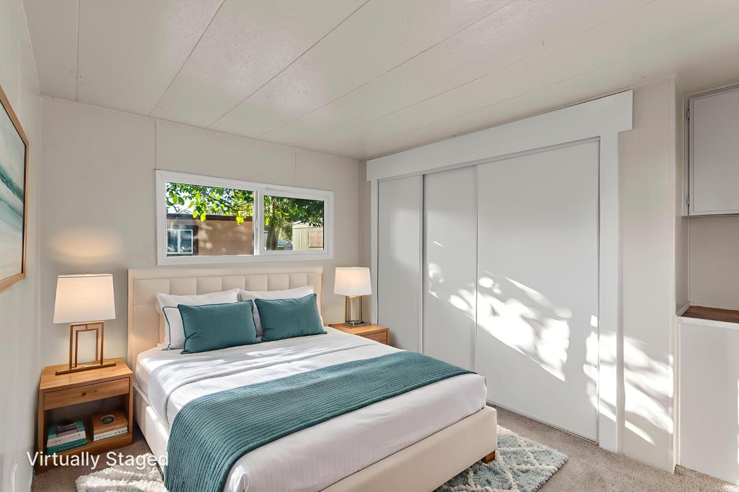 1523 North Beale Road, Unit 38 Marysville, CA 95901 - Photo 18 of 24 a bedroom with a bed and a lamp