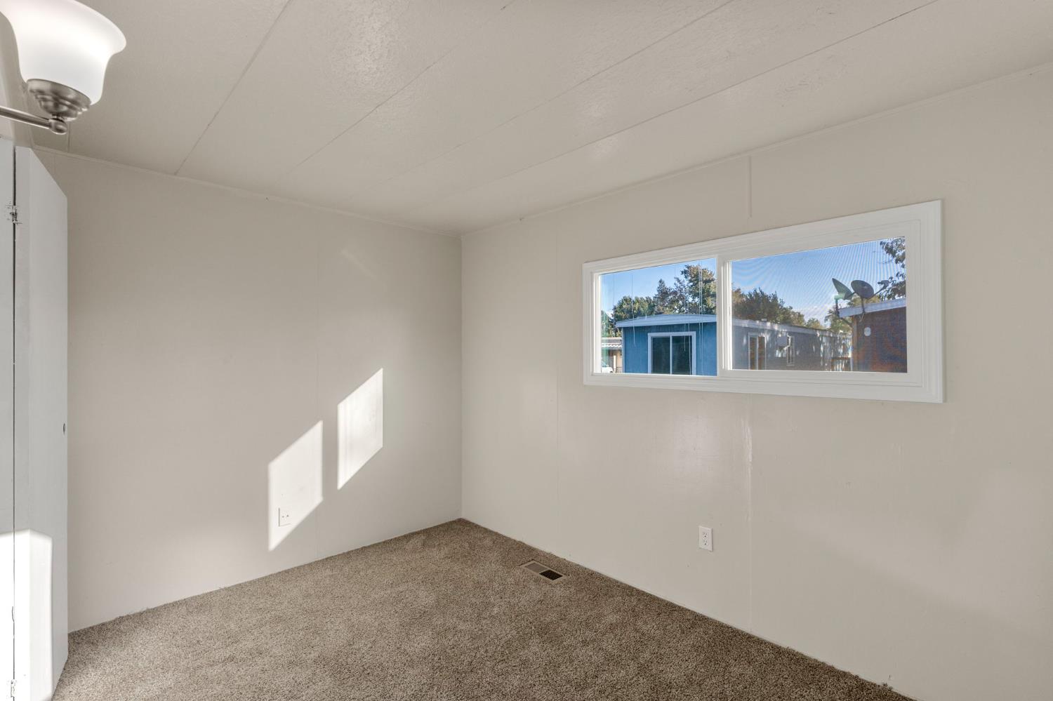 1523 North Beale Road, Unit 38 Marysville, CA 95901 - Photo 20 of 24 a view of empty room with windows