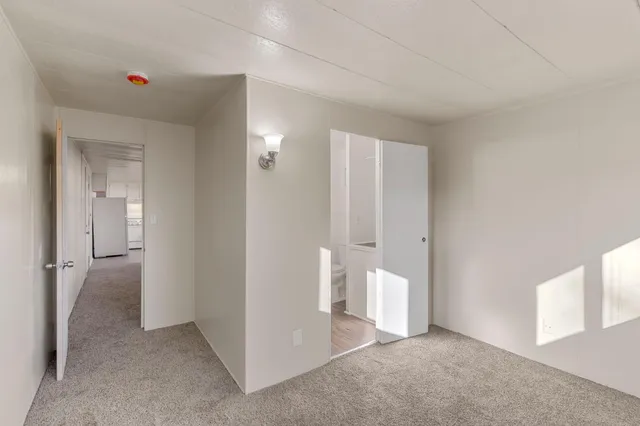 a view of a room with an empty space