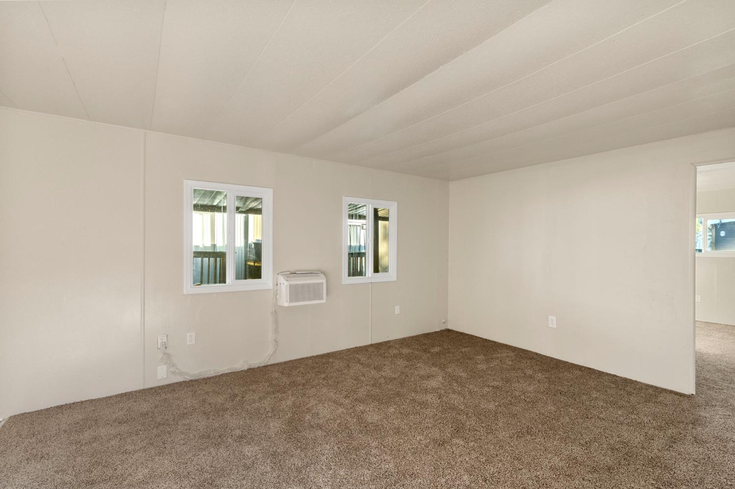 1523 North Beale Road, Unit 38 Marysville, CA 95901 - Photo 8 of 24 an empty room with windows