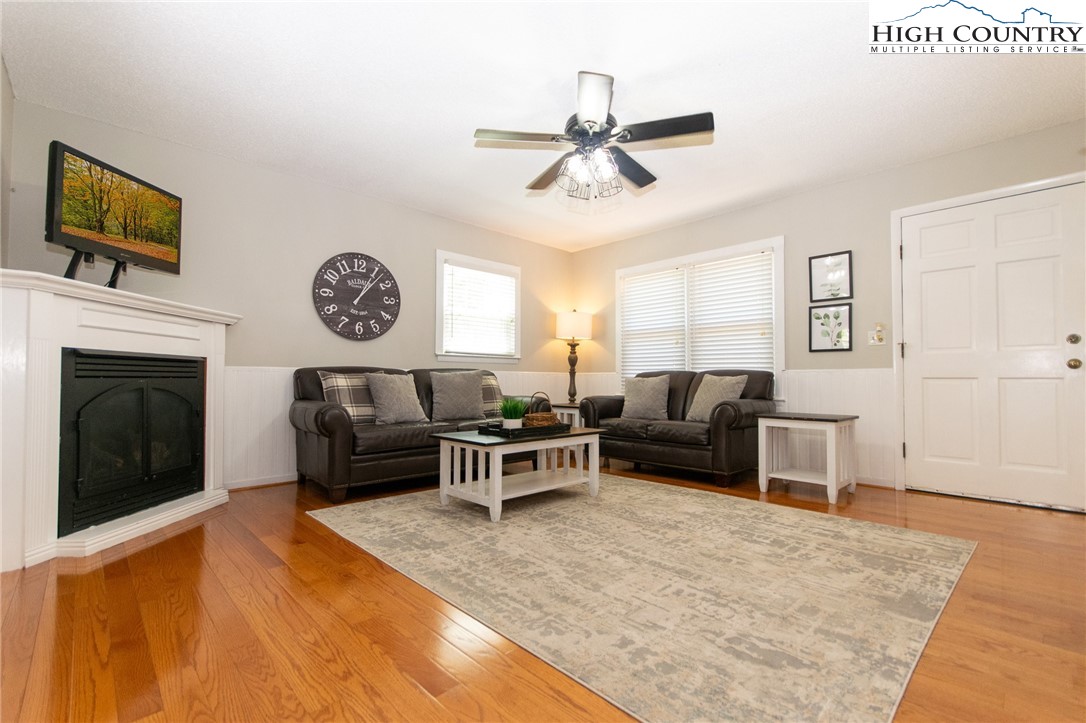1268 Pine Run Road Boone, NC 28607 - Photo 12 of 48 a living room with furniture and a fireplace