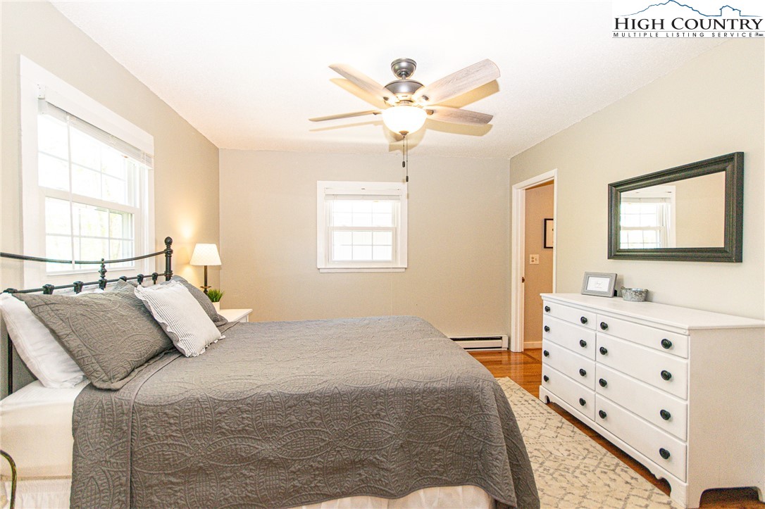 1268 Pine Run Road Boone, NC 28607 - Photo 16 of 48 a bedroom with a bed and a window