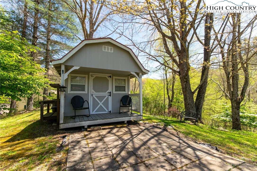 1268 Pine Run Road Boone, NC 28607 - Photo 42 of 48 a view of a house with a yard
