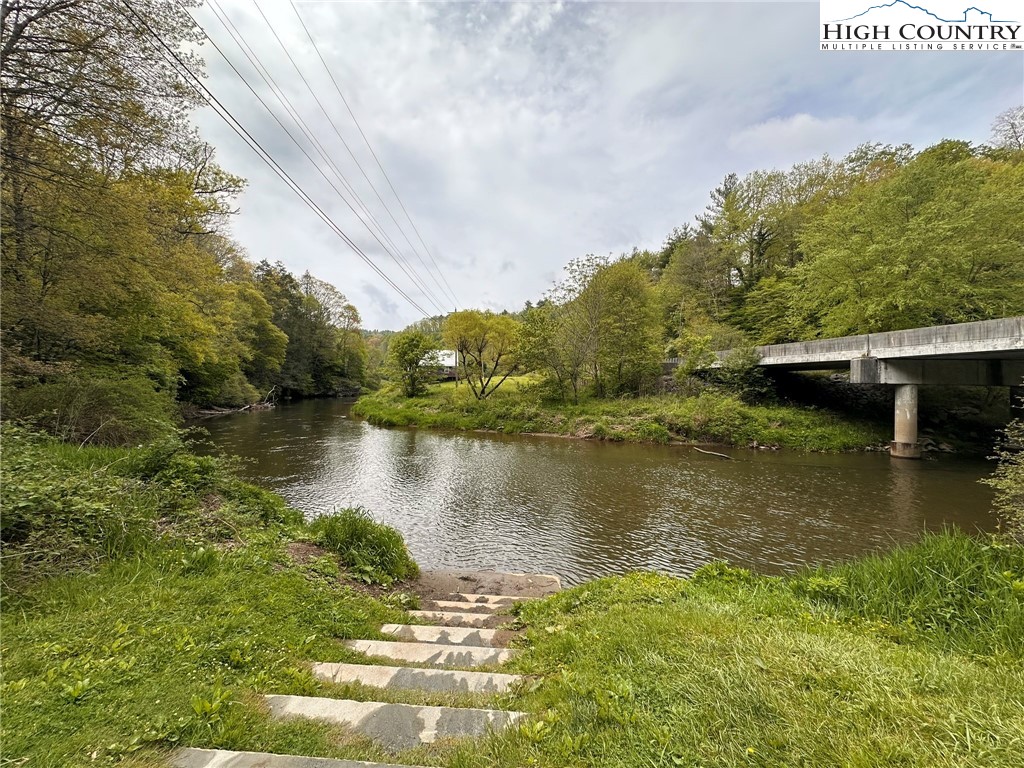 1268 Pine Run Road Boone, NC 28607 - Photo 48 of 48 a view of a lake with houses in the back