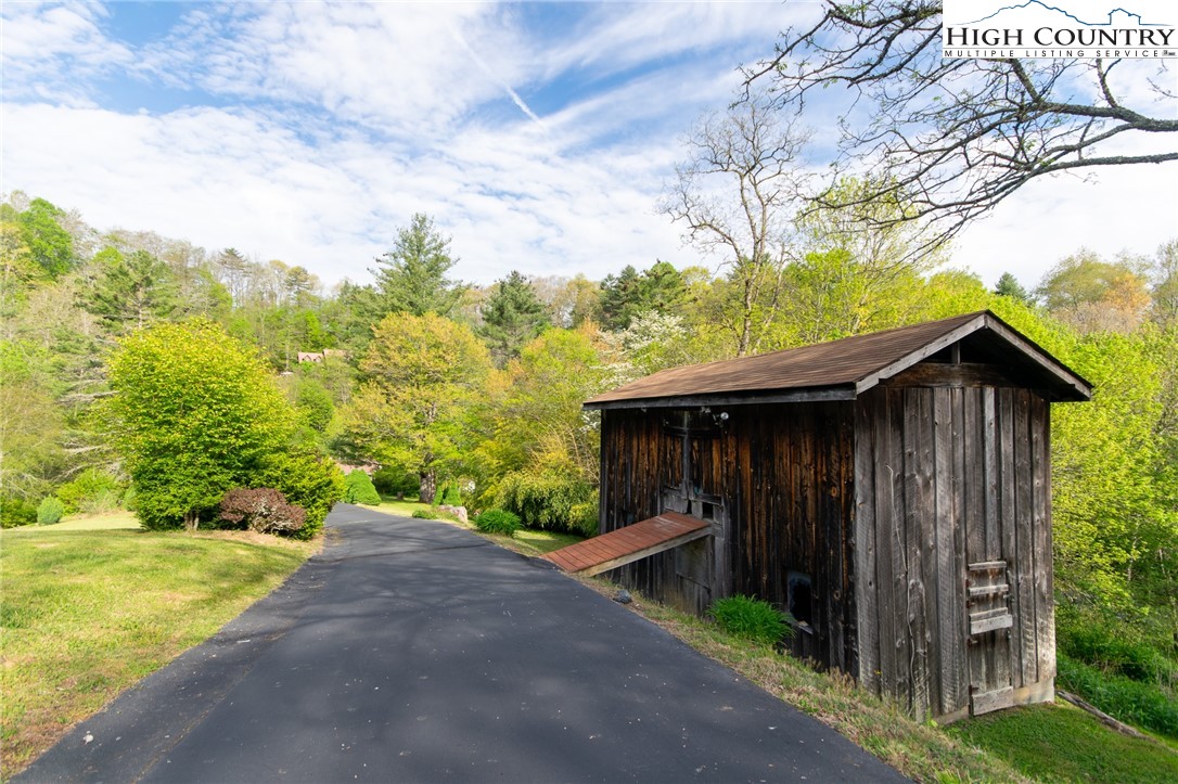 1268 Pine Run Road Boone, NC 28607 - Photo 8 of 48 a view of a backyard with pathway