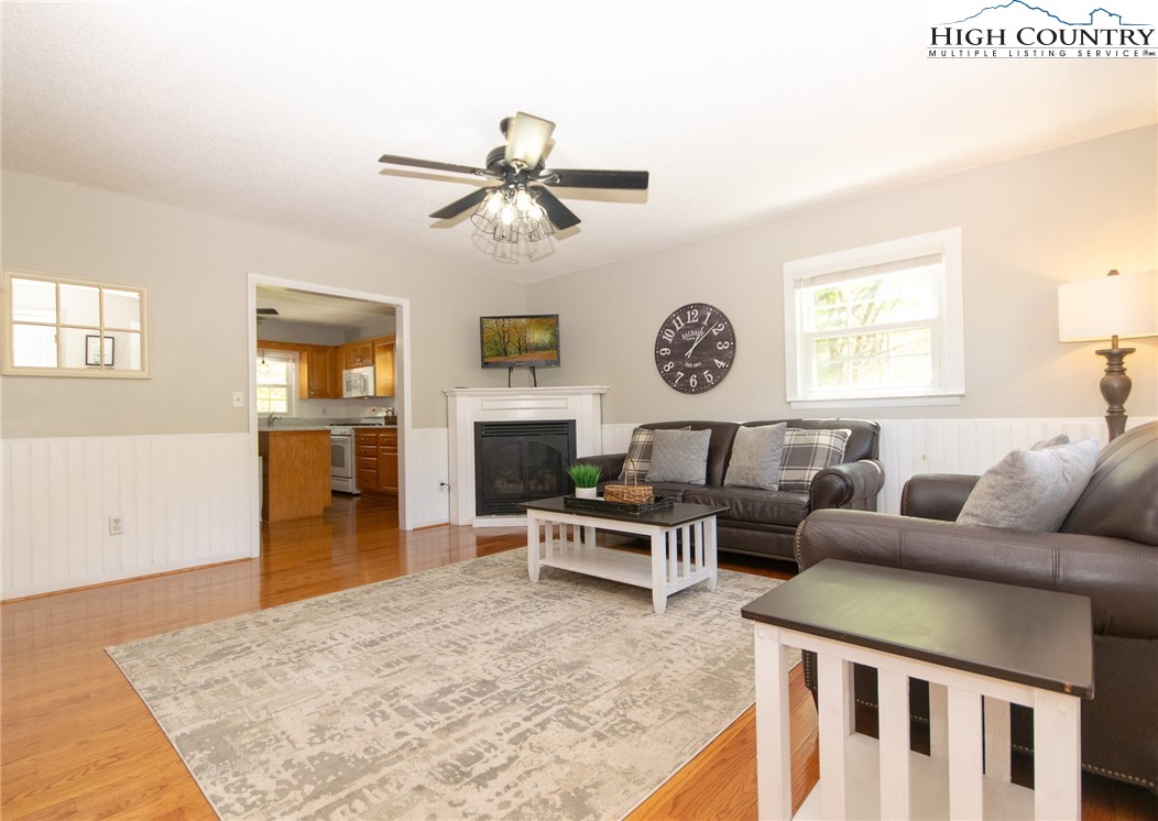 1268 Pine Run Road Boone, NC 28607 - Photo 10 of 48 a living room with furniture and a fireplace