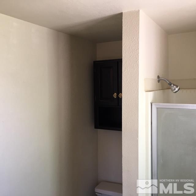 14060 Perlite Drive Reno, NV 89521 - Photo 11 of 15 a bathroom with a sink and a mirror